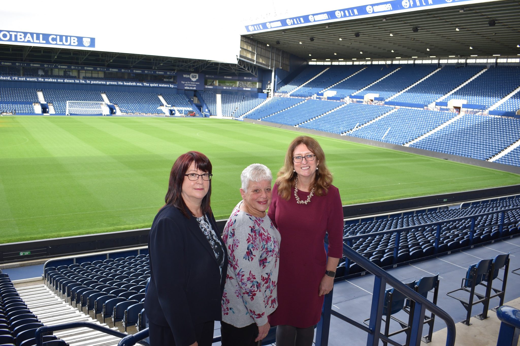 Frances and Jacqui with a foster carer in the West Brom football stadium