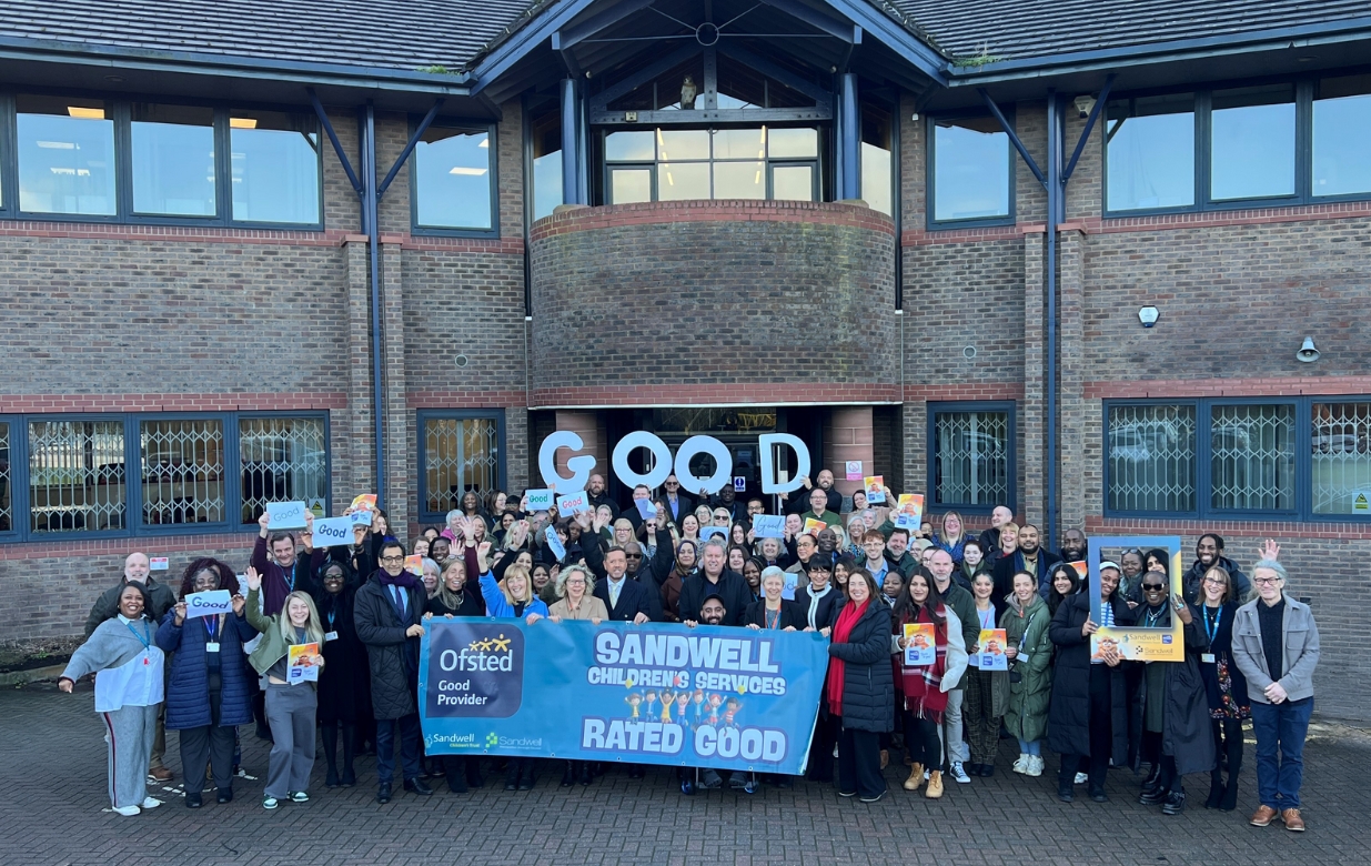 Group photo of staff celebrating Ofsted good rating